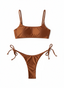 Brown bikini set with thin straps and tied sides on a white background