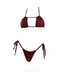 Burgundy bikini set on a white background
